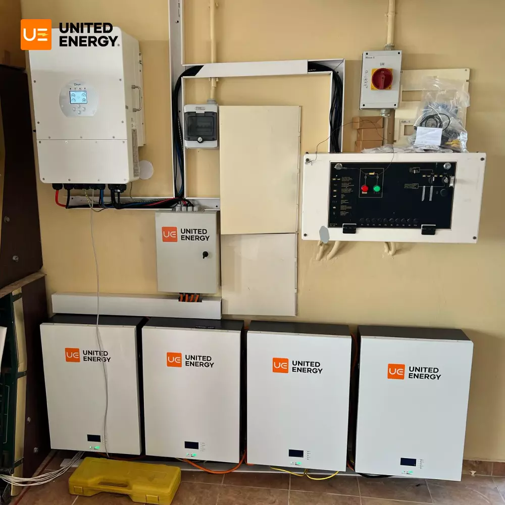 A hybrid inverter and 4 wall-mounted solar lithium batteries used in a 12kw home solar project